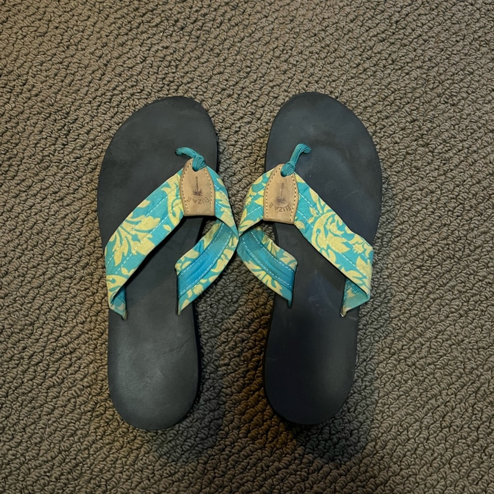 Vibrant Flip Flops With Patterned Straps - image 1